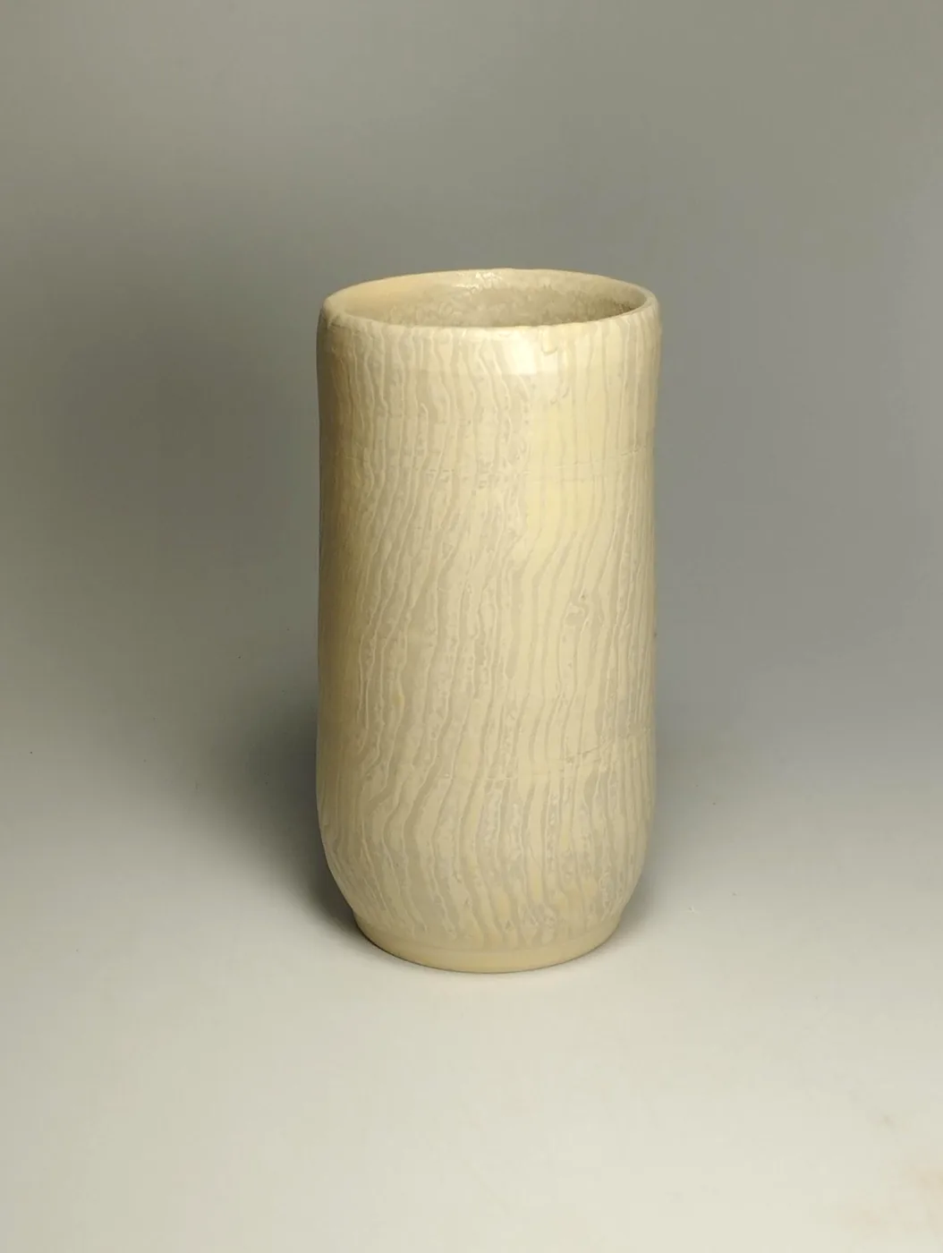 A cream stoneware vessel by Bea Calafell